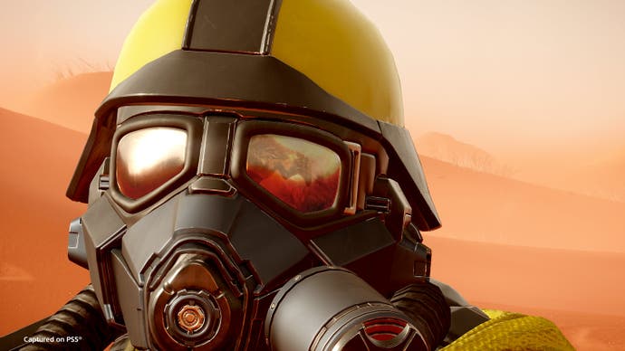 helldivers 2 premium warbond theme image showing a close up of a soldier wearing a yellow helmet and a black mask