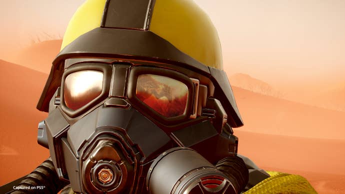 Helldivers 2 premium warbond image showing close up of a soldier in a yellow helmet and black mask.