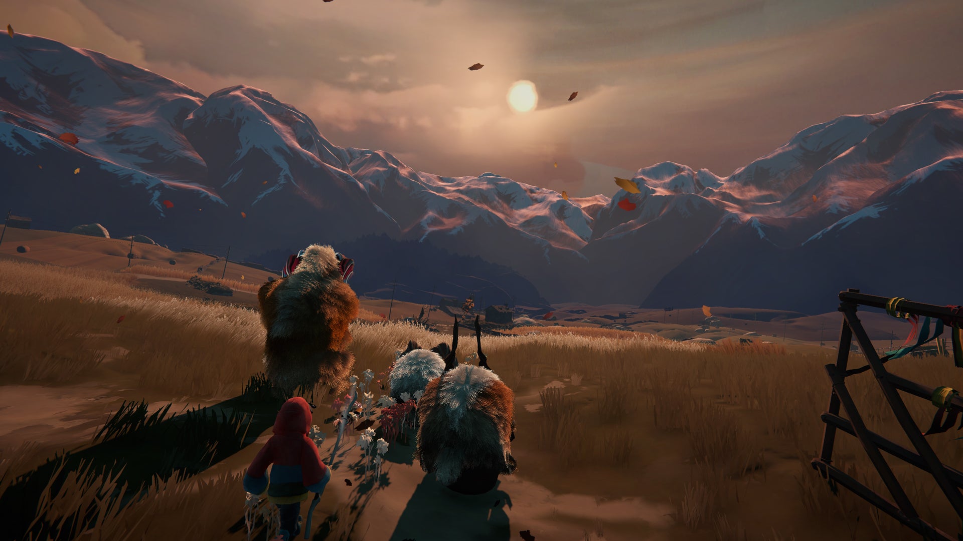 A young hoodie-wearing boy is herding a group of horned creatures through a big field, a mountain in the horizon in a screenshot of Herdling. - 1