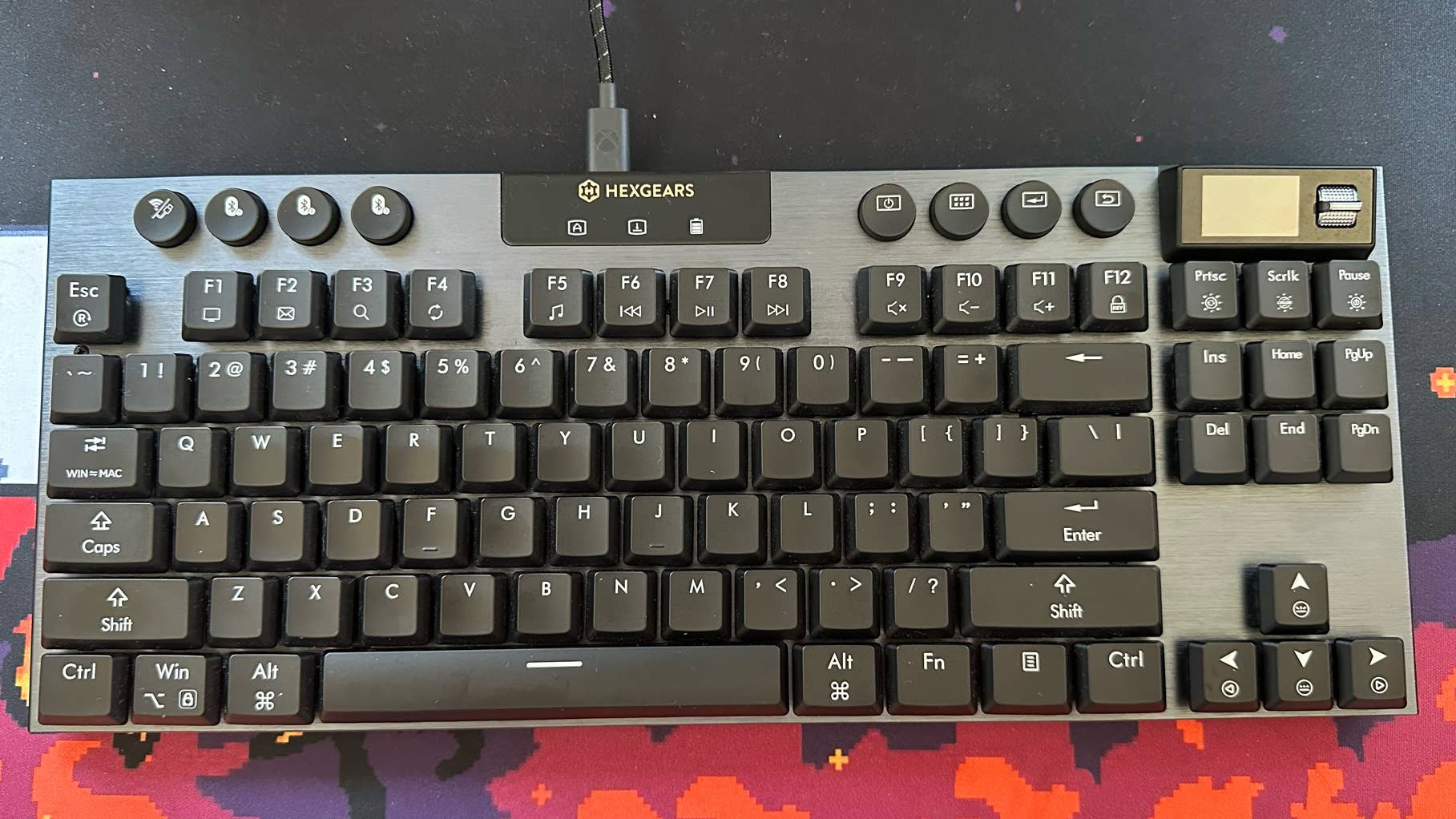 Hexgears Immersion A3 keyboard, one that looks a bit like the Logitech G915 TKL but with a screen