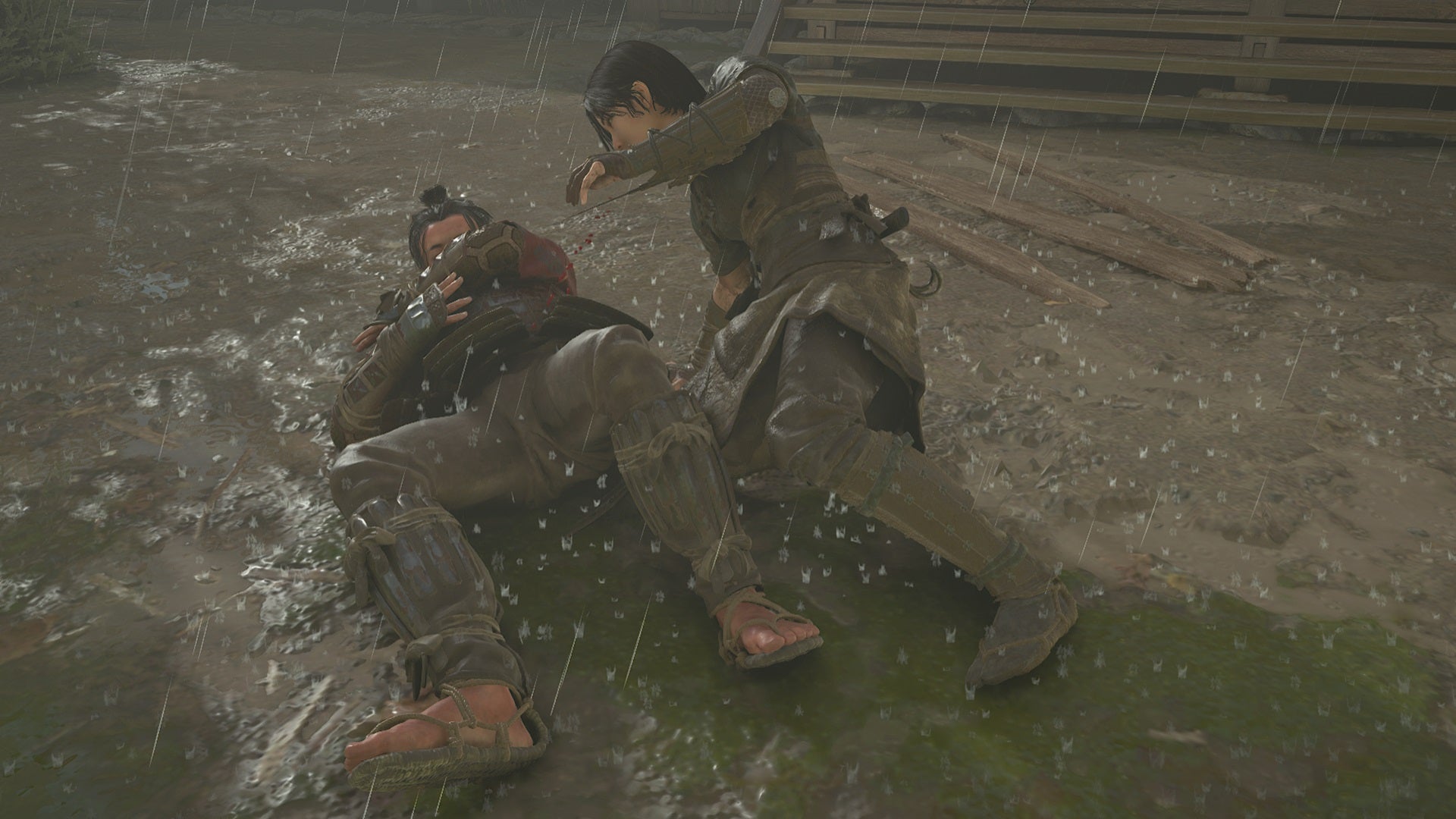 Naoe leans over a fallen opponent after stabbing him with her hidden blade in Assassin's Creed Shadows. - 9