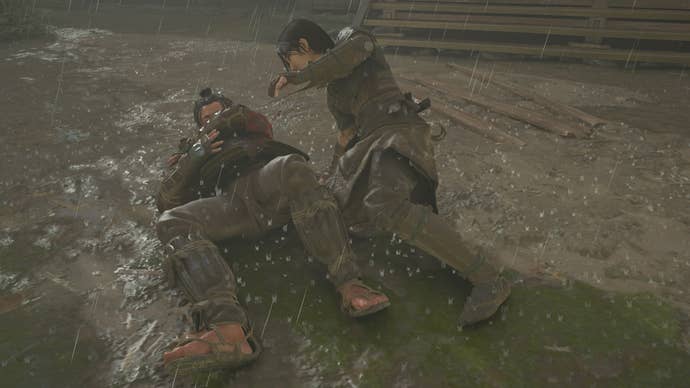 Naoe leans over a fallen opponent after stabbing him with her hidden blade in Assassin’s Creed Shadows.