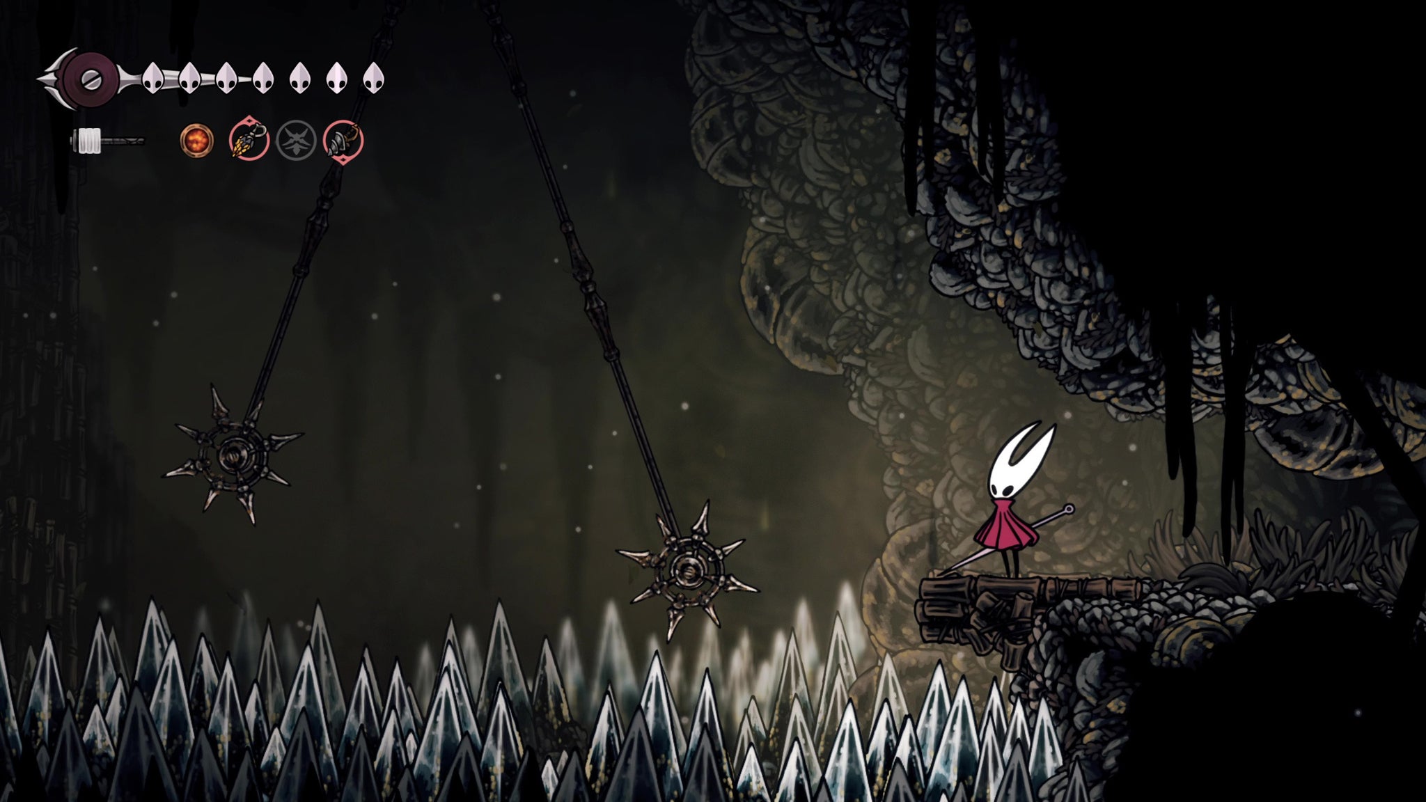 Hornet stands at the start of the platforming challenge to fix the Sinner's Road Bench in Hollow Knight: Silksong. - 8