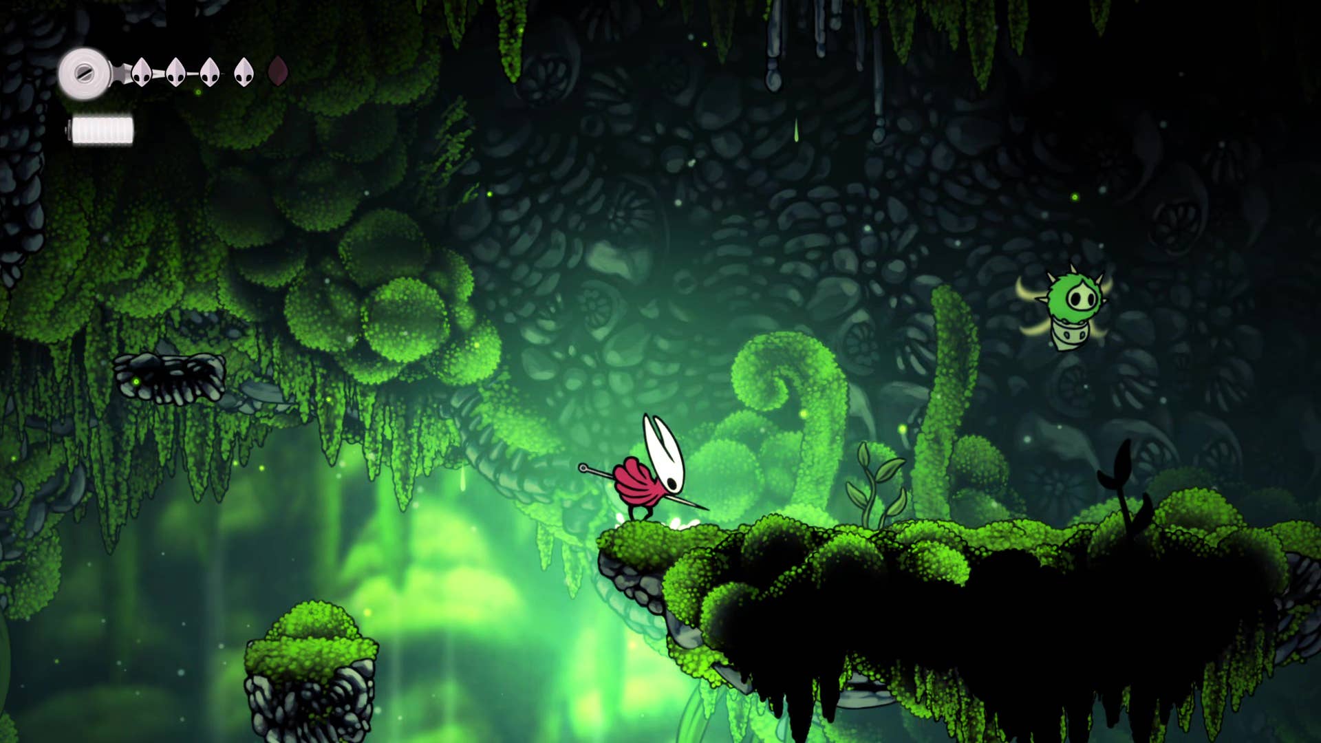 Screenshot of Hollow Knight: Silksong showing the path through the cave of Moss.