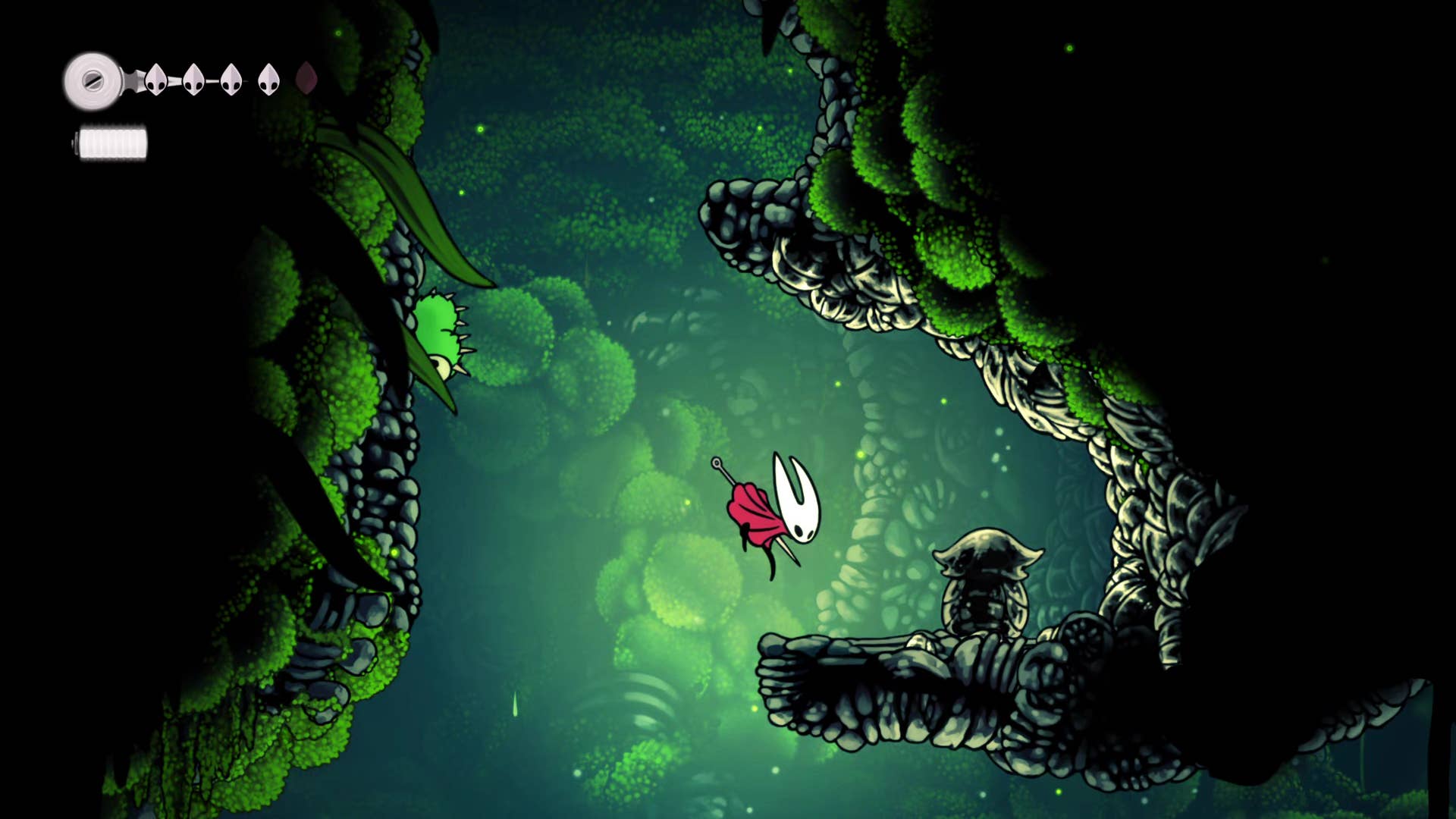 Screenshot of Hollow Knight: Silksong showing the path through the cave of Moss.