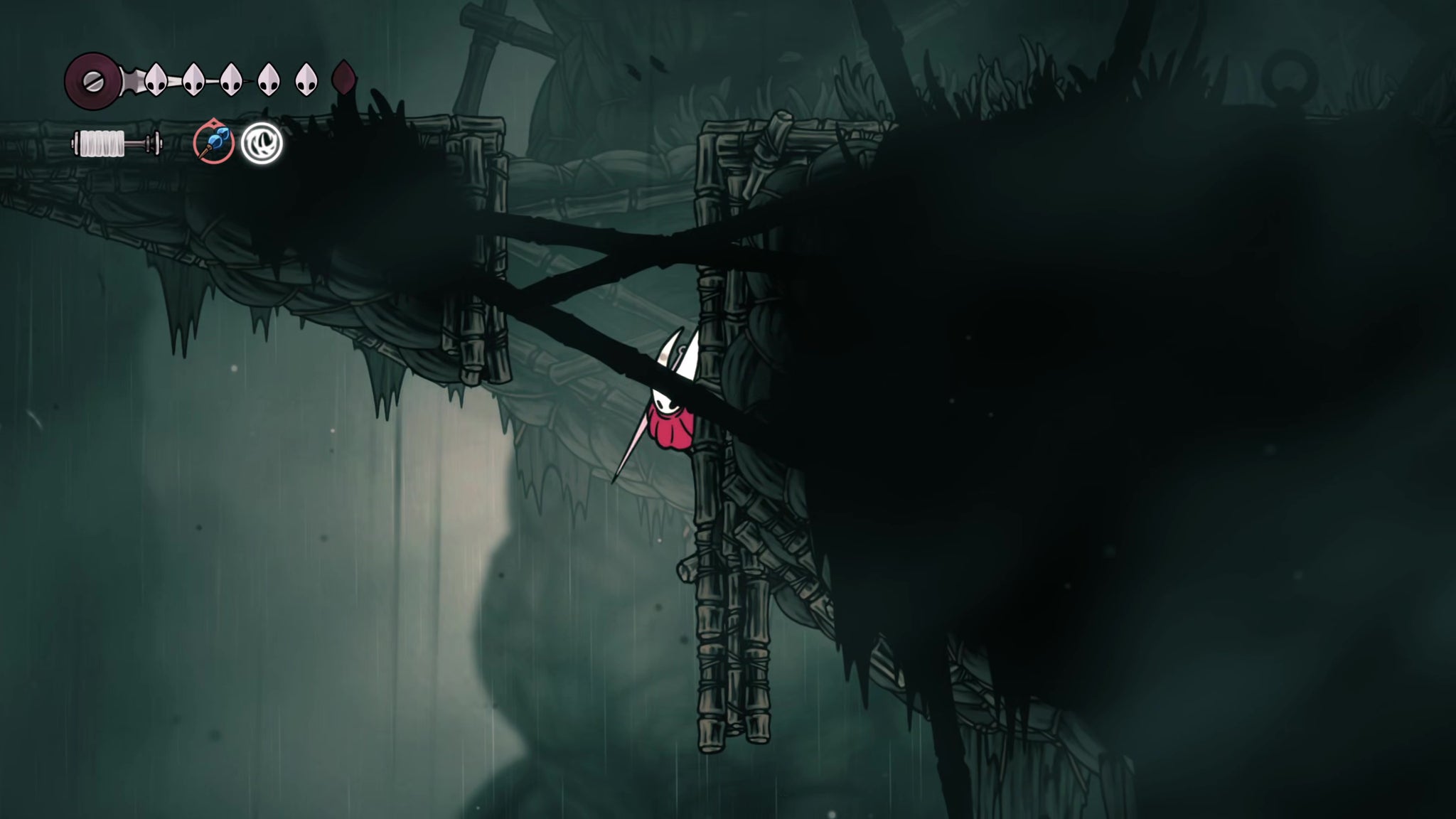 A screenshot of Hollow Knight: Silksong showing the path through Greymoor. - 18