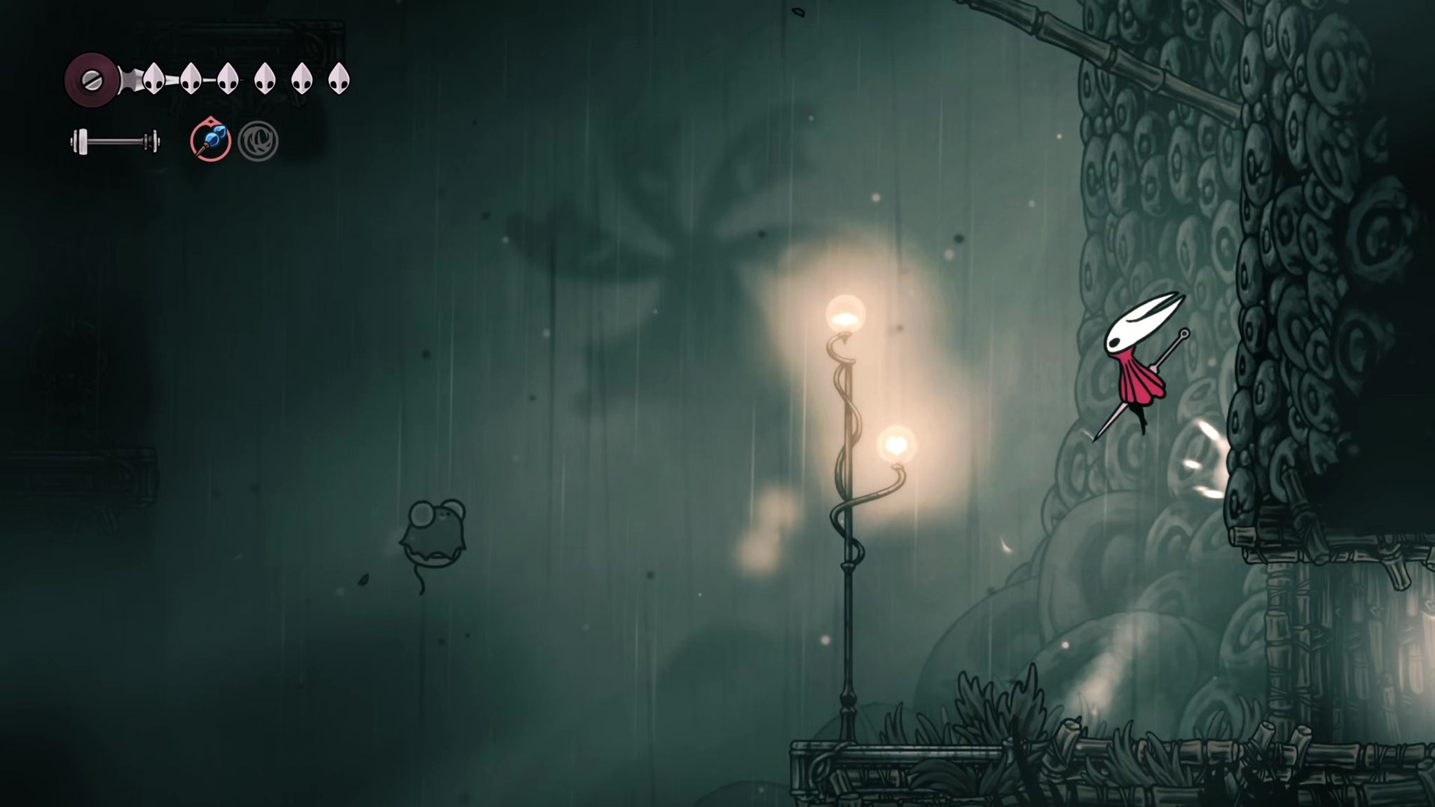 A screenshot of Hollow Knight: Silksong showing the path through Greymoor. - 34