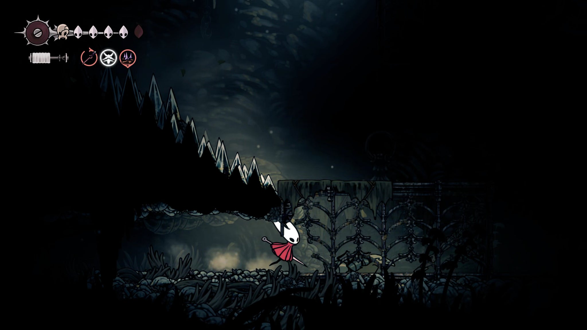A screenshot of Hollow Knight: Silksong showing the path through Greymoor. - 28