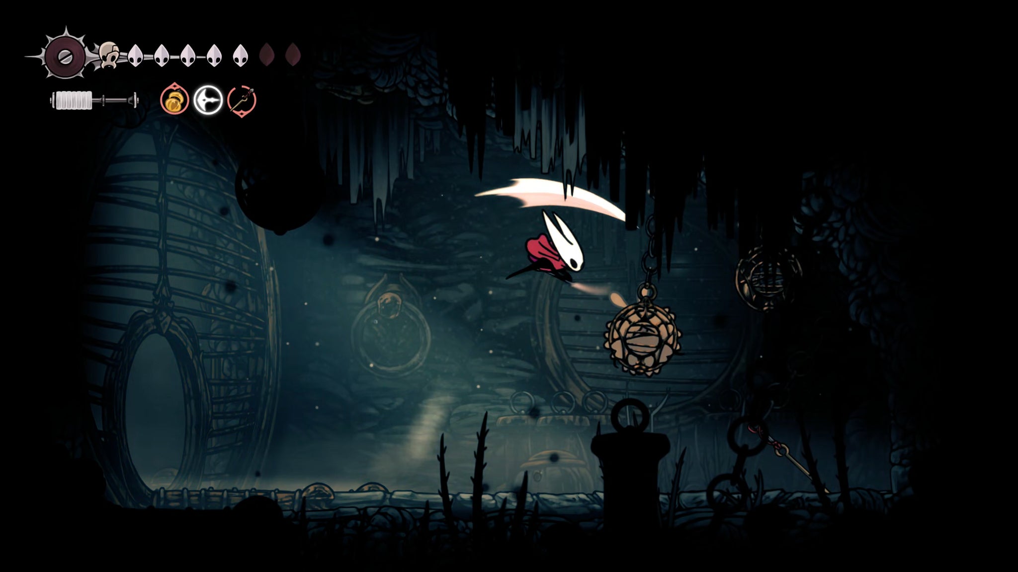 A screenshot of Hollow Knight: Silksong showing the path through The Slab. - 15