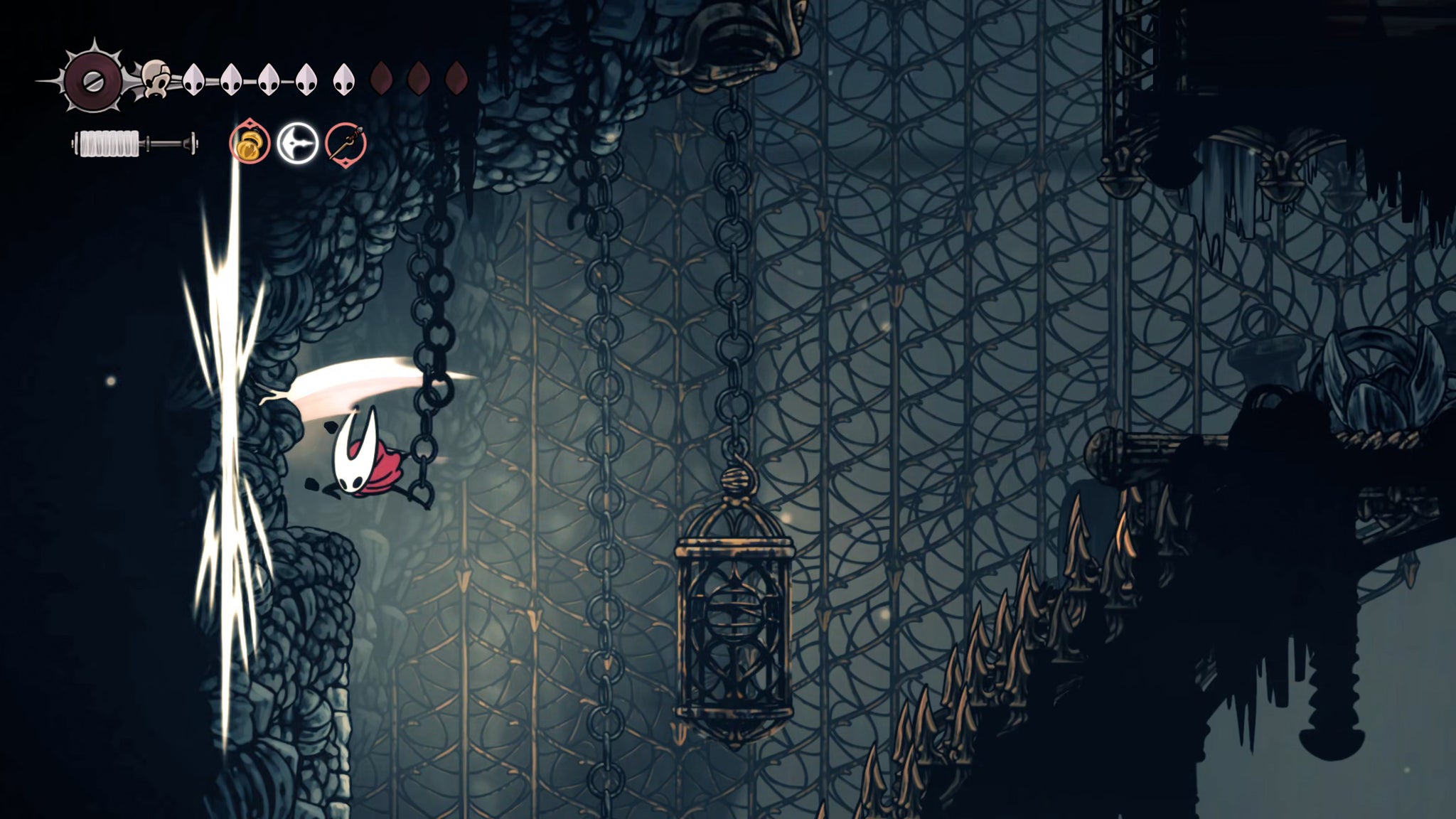 A screenshot of Hollow Knight: Silksong showing the path through The Slab. - 31