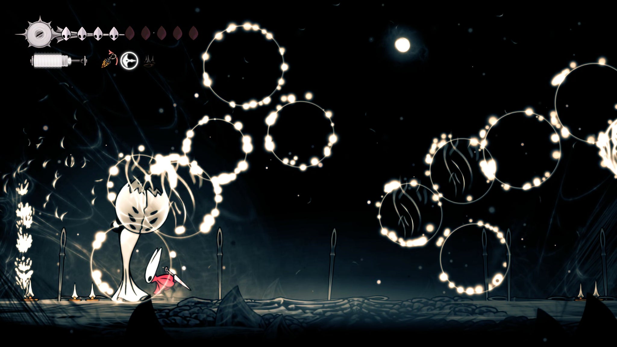 A screenshot of Hollow Knight: Silksong showing the path through The Slab. - 45