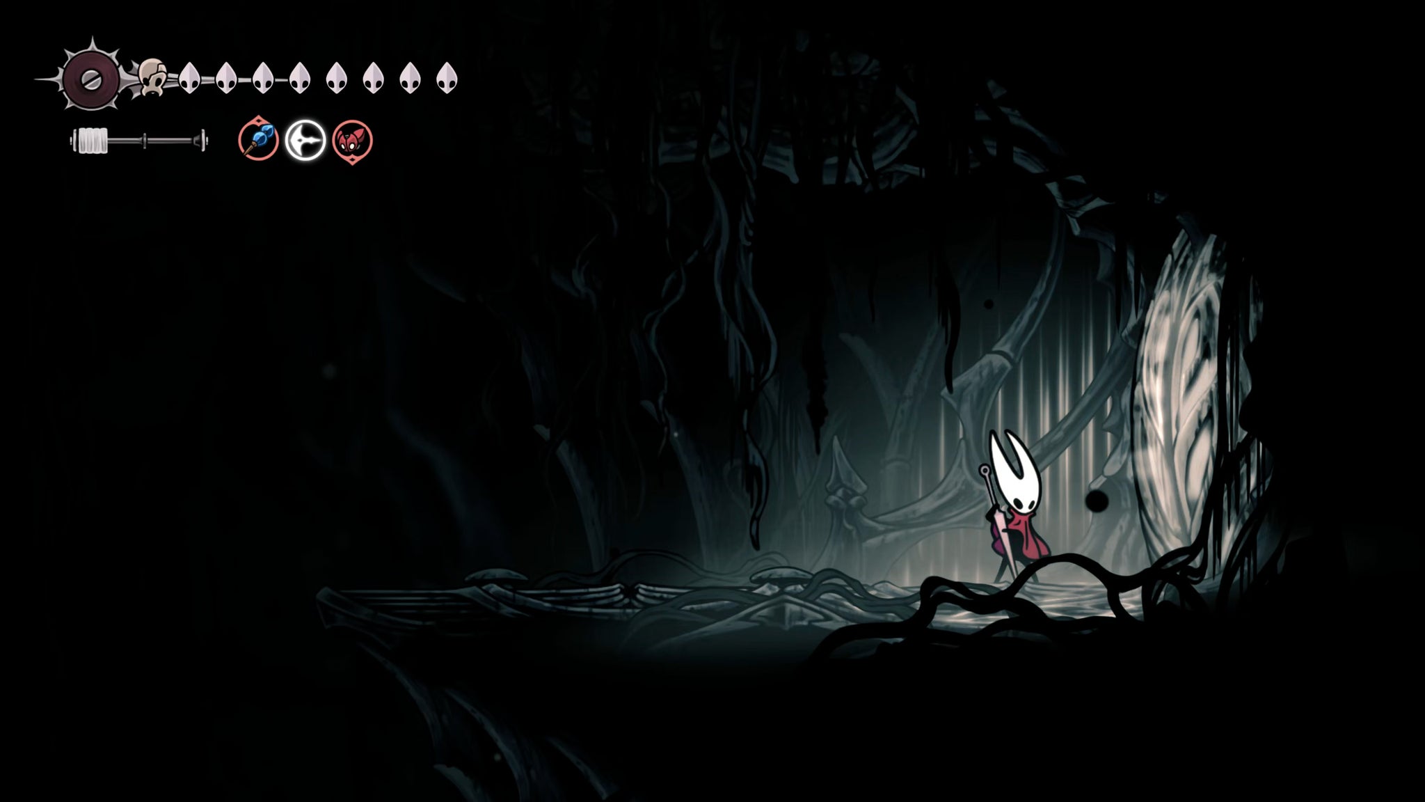 A screenshot of Hollow Knight: Silksong showing the path through The Abyss. - 27