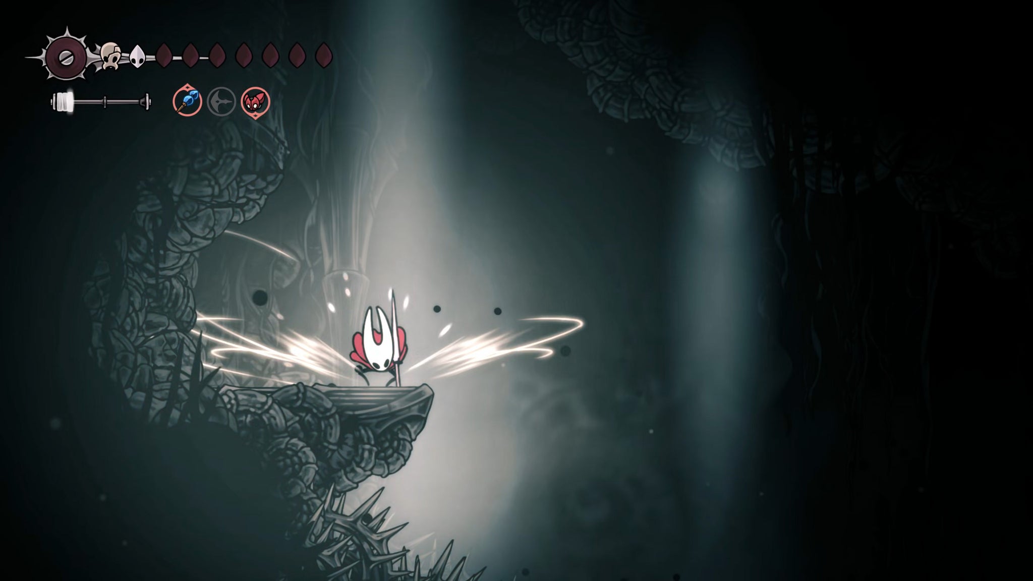 A screenshot of Hollow Knight: Silksong showing the path through The Abyss. - 38