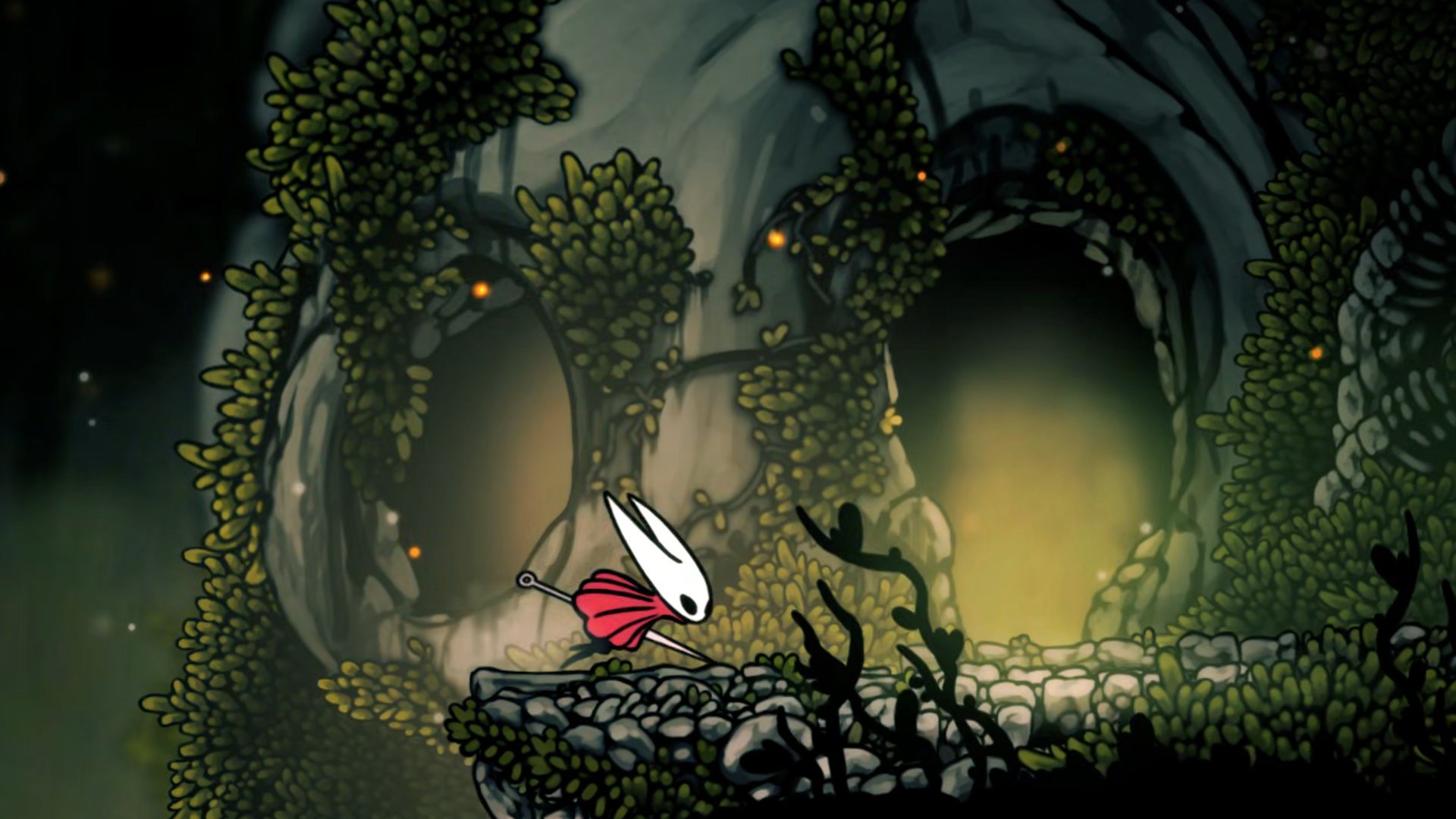 Hornet in Hollow Knight: Silksong sprints along a ledge in Far Fields with a giant skull-shaped cavern entrance in the background. - 1