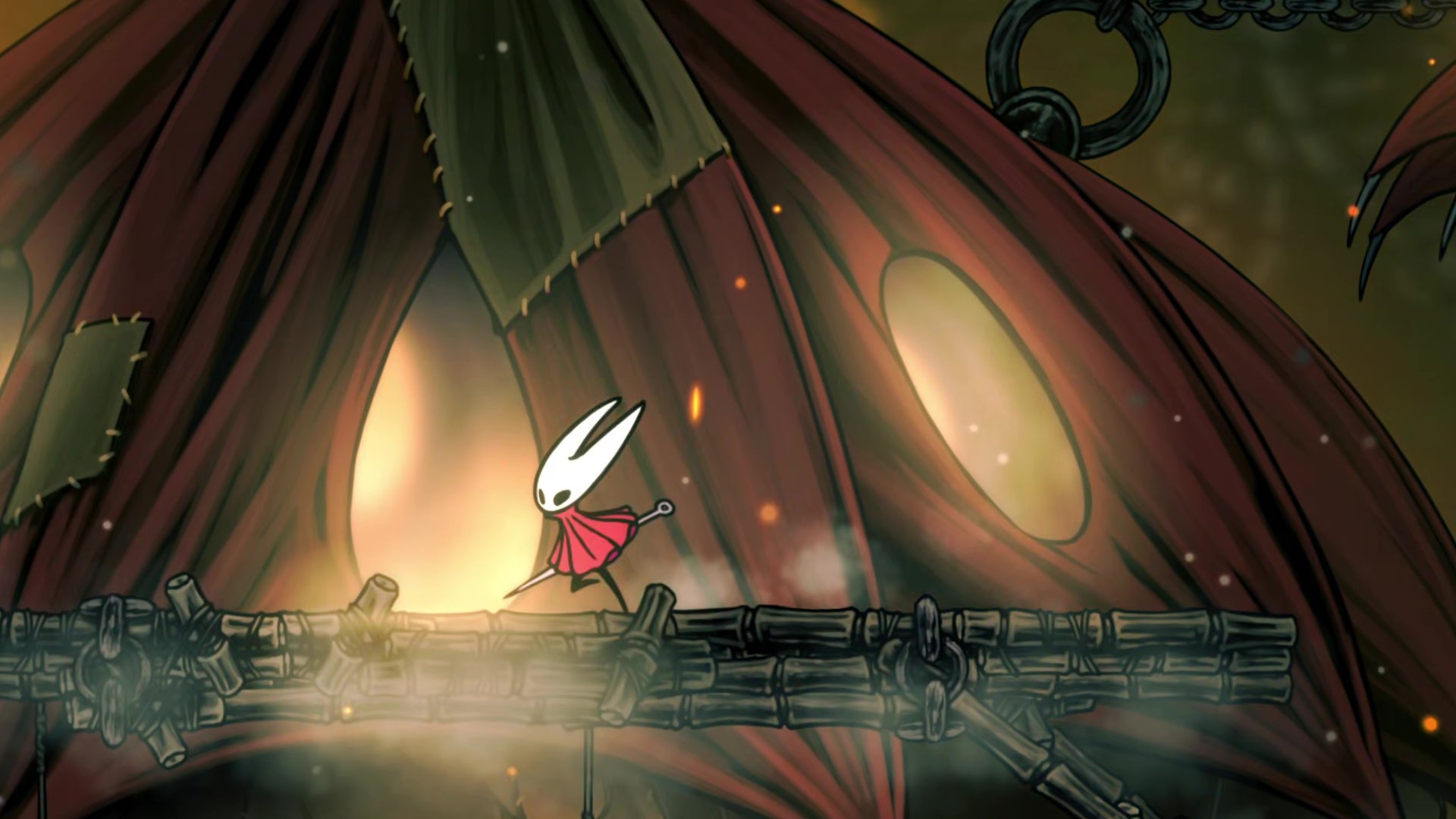 Hornet in Hollow Knight: Silksong enters the home of the Seamstress in the Far Fields. - 1