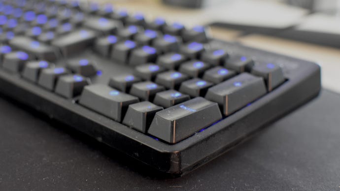A close-up of a dirty keyboard, ready to be cleaned.