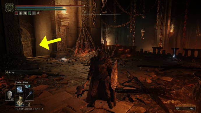 Standing in Taylew’s Ruined Forget in Elden Ring: Shadow of the Erdtree. A yellow arrow points to the left, showing where to go.