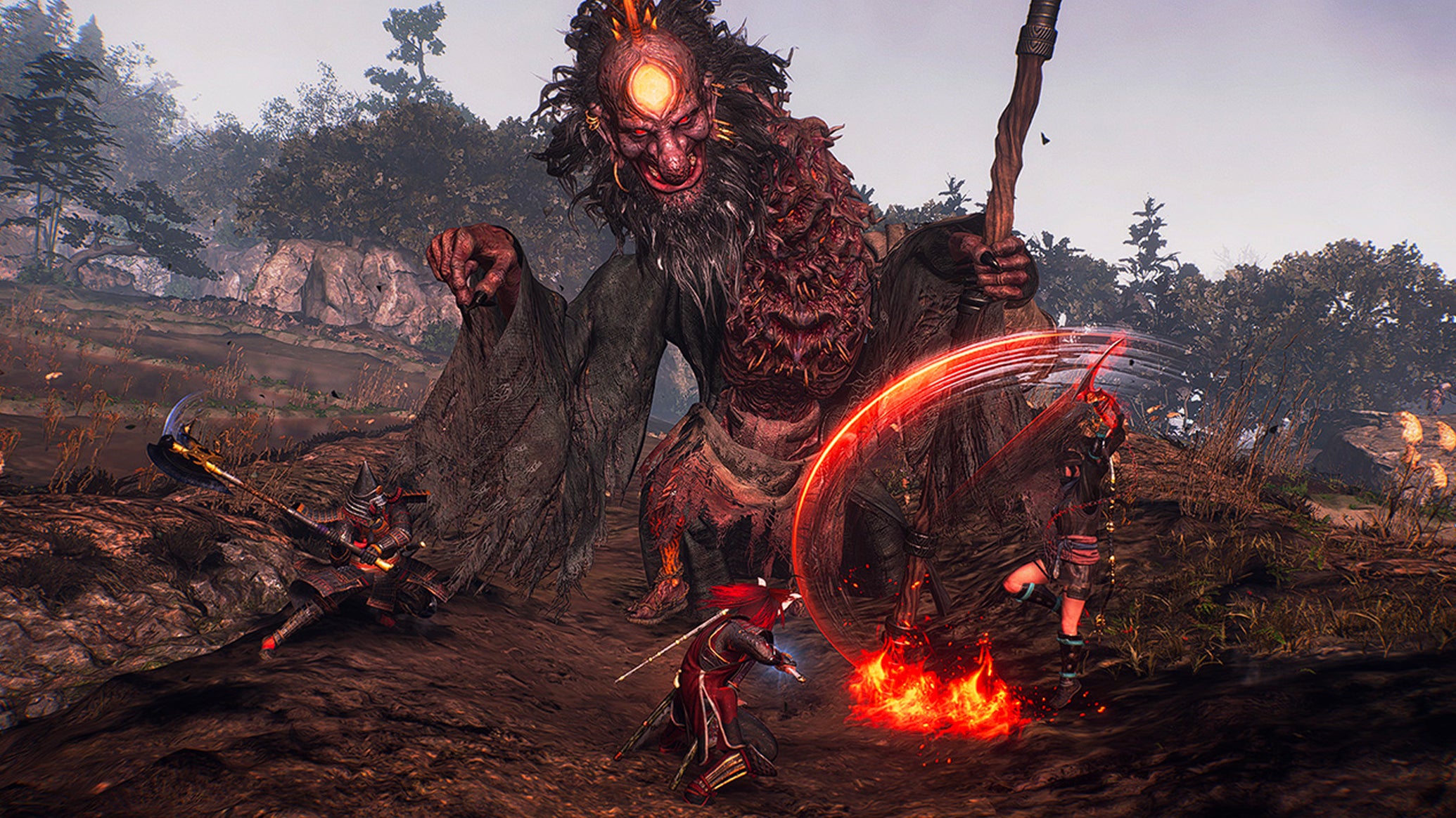 A co-op fight taking player in Nioh 3, with a group of characters battling a huge yokai monster. - 1