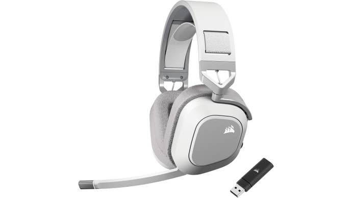 corsair hs80 max gaming headset, shown with a 2.4GHz USB dongle in white