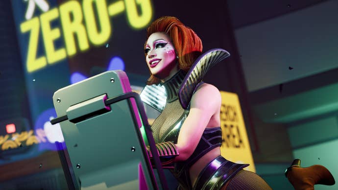 A woman with red hair and white and pink makeup, dressed in what you get if you google ‘sexy space Halloween costume’, looking absolutely delight in a screen from Hyenas