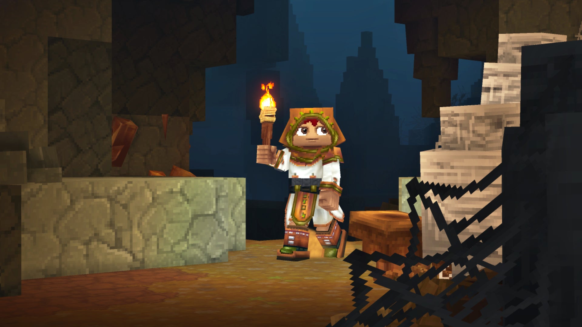 A Hytale player walks towards the camera in a cave system underground, holding a torch to light their surroundings. - 4