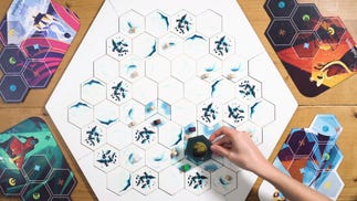 Delve through frost-choked arctic ruins one layer at a time in competitive board game Ice