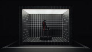 A still from Ikea's video introducing their range of gaming furniture, showing a gaming chair sat inside a cube covered in grid lines.
