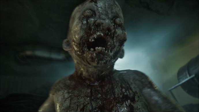 A monster with bared teeth and bulging eyes grabs the player.