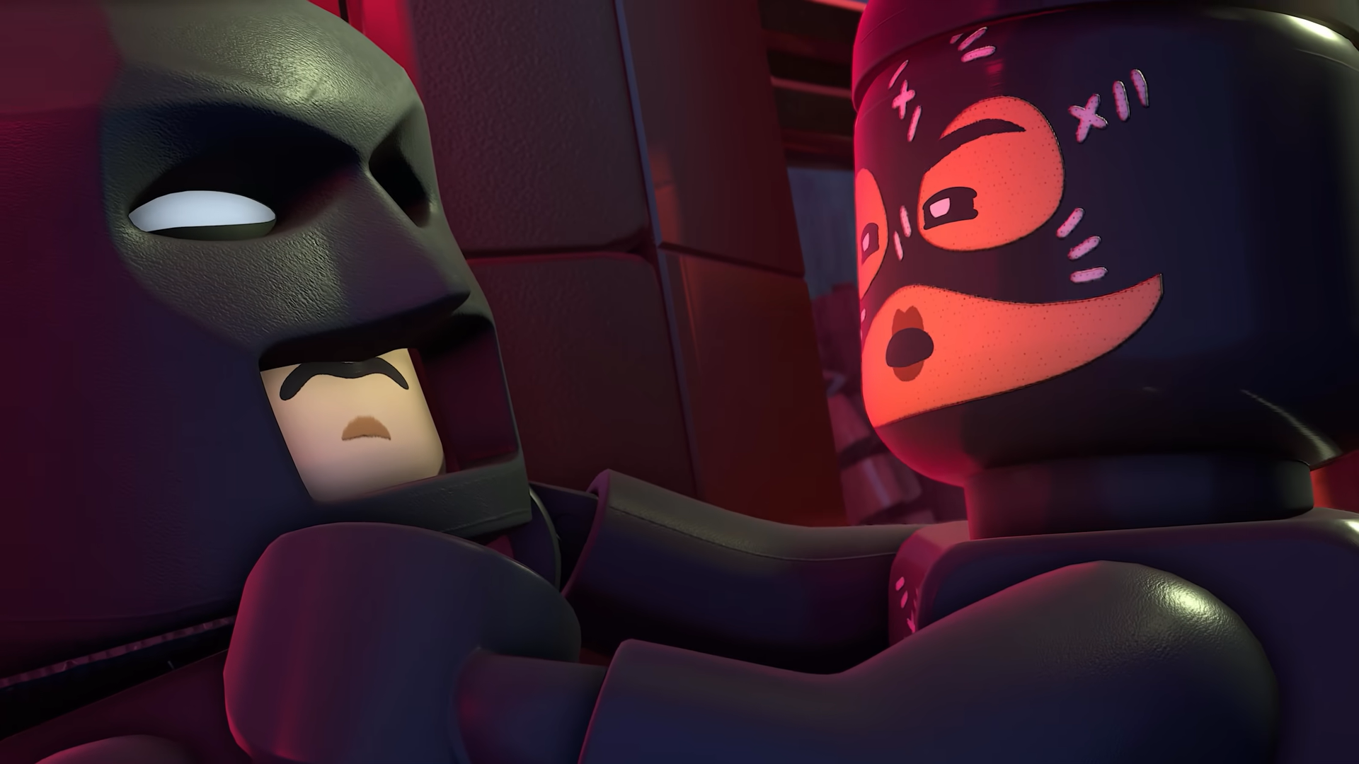 Batman and Catwoman facing each other in Lego Batman Legacy of the Dark Knight