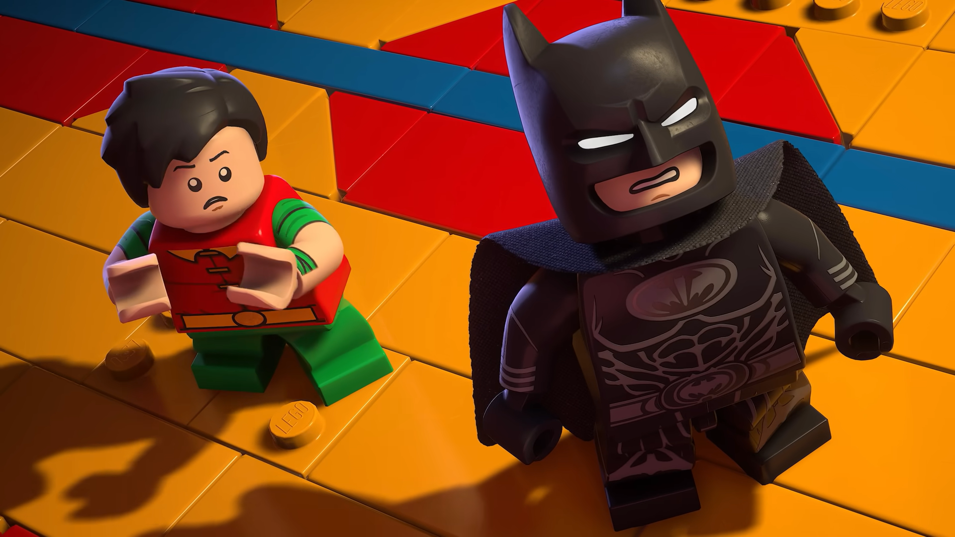 Batman and Dick standing in a circus in Lego Batman Legacy of the Dark Knight