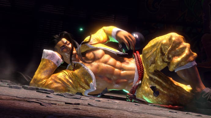Jamie lies nonchalantly on the ground, shirt open in Street Fighter 6.