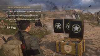 In Call of Duty: WW2, loot boxes drop from the sky onto Normandy beach and open in front of other players
