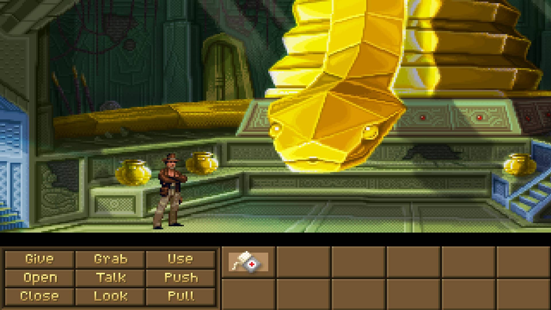 A very nicely drawn pixel art indy stands in front of a giant yellow snake statue in this mockup from the unfinished Whanga Main Diana Jones and the fountain of youths.