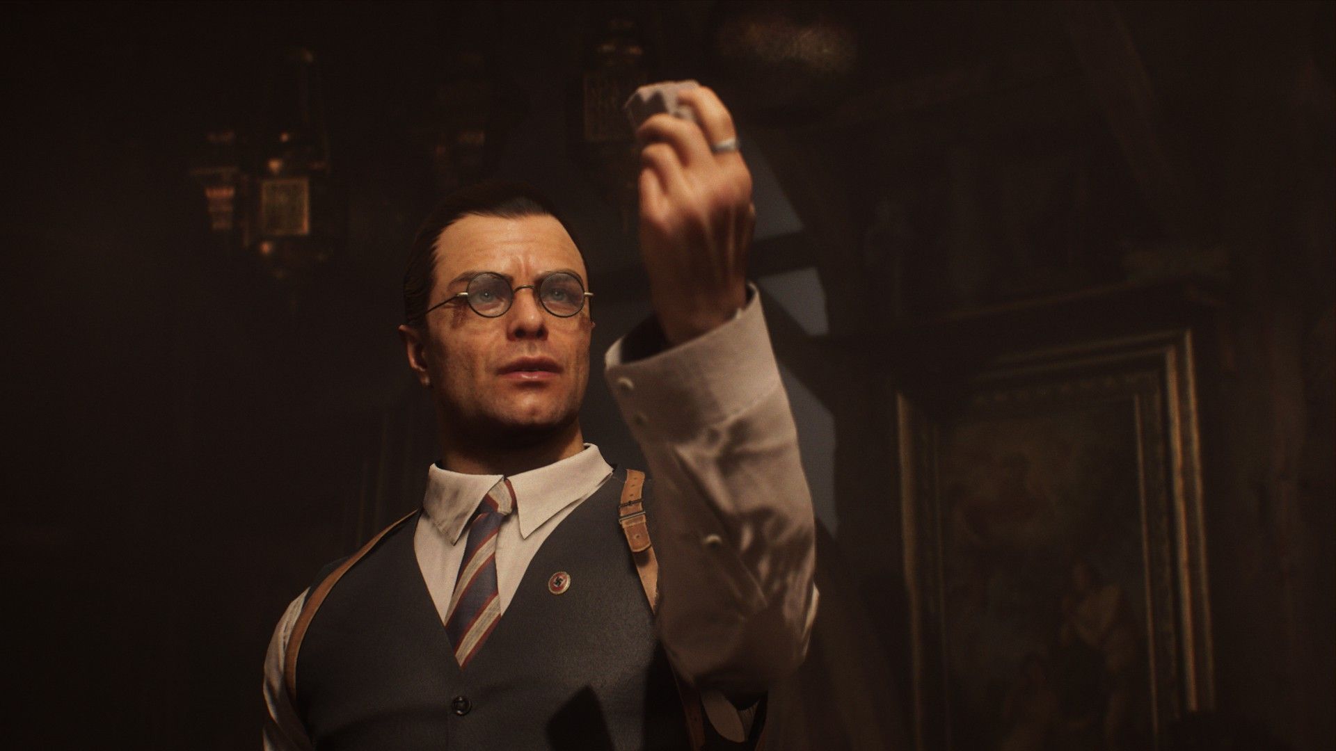 Voss holds a relic up the light. - 5