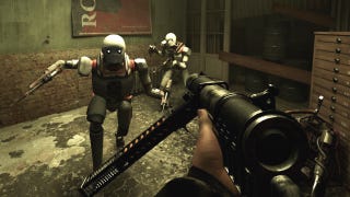 An Industria screenshot showing two robots in a dilapidated East Berlin warehouse charging at the player, who brandishes a gun in first-person.