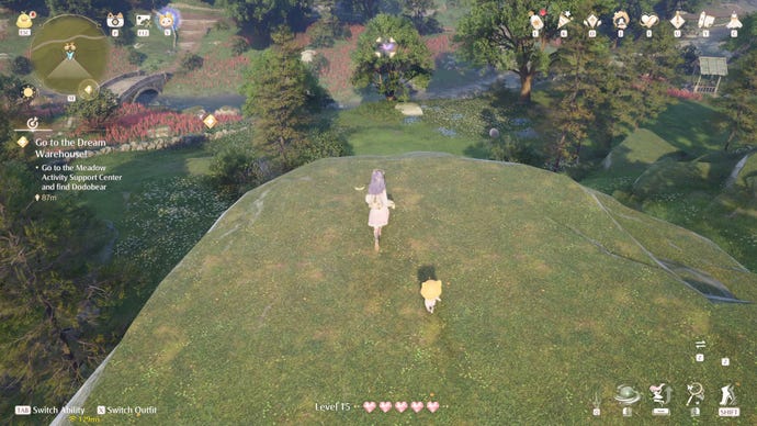 Nikki in Infinity Nikki in the process of collecting a Whimstar in the region of Breezy Meadow.