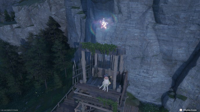 Nikki in Infinity Nikki in the process of collecting a Whimstar in the region of Breezy Meadow.