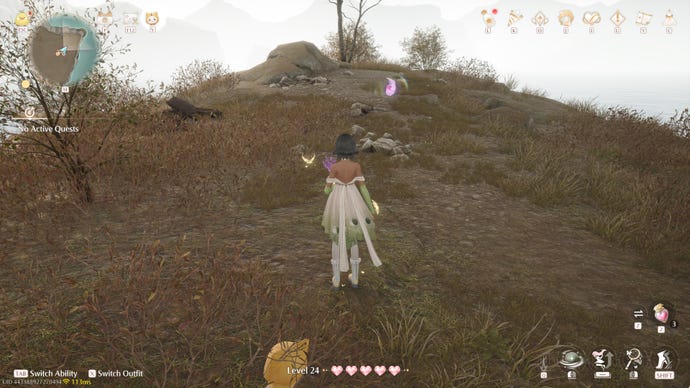 Nikki in Infinity Nikki in the process of collecting a Whimstar in the region of Breezy Meadow.