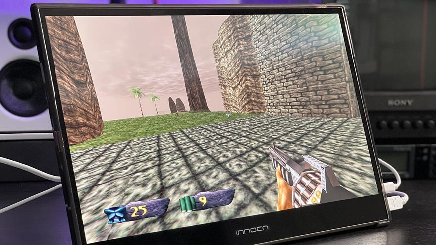 an innocn oled portable monitor, showing a retro game