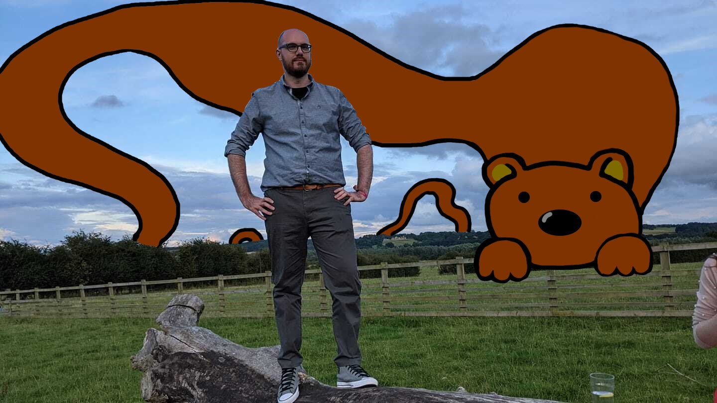 A photo of James Archer posing next to Horace