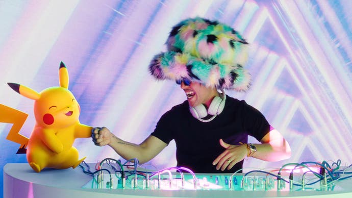 Pikachu giving DJ Jax Jones in his oversized hat a fist bump
