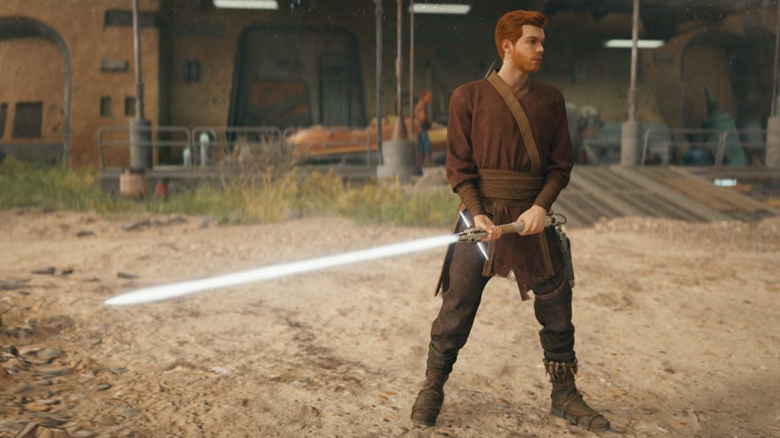 Cal stands outside Pyloon’s Saloon holding a white crossguard lightsaber in Star Wars Jedi: Survivor.