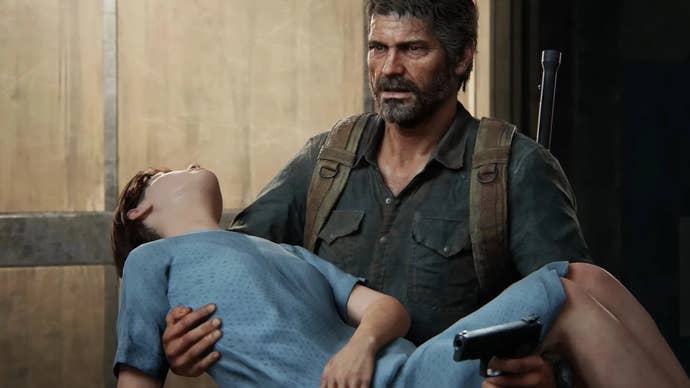 Joel holds an unconscious Ellie while pointing a gun in The Last of Us
