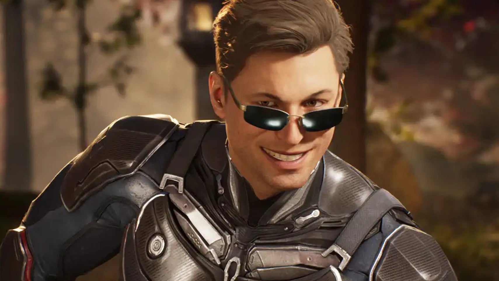 Johnny Cage in Mortal Kombat 1, he's got a big smirk on his face, his sunglasses lowered slightly so you can see his eyes. - 1