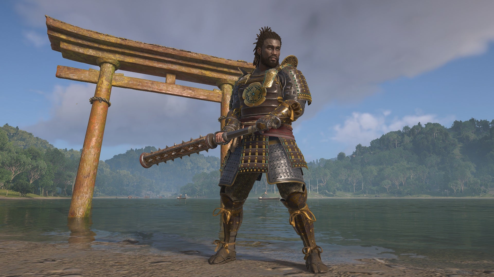 Yasuke stands strong with his kanebo in Assassin's Creed Shadows, in front of a torii gate. - 6