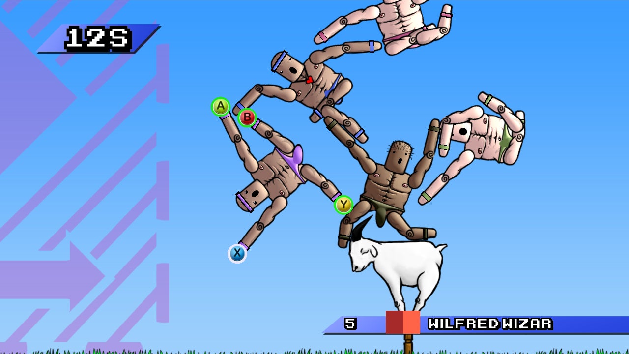 Five men attempt to climb on top of each other to reach higher than all the others.