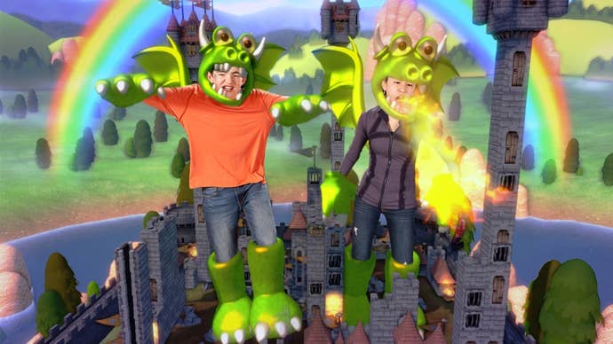 Kinect Party screenshot showing a fantasy kingdom with players taking on the roles of fire breathing dragons