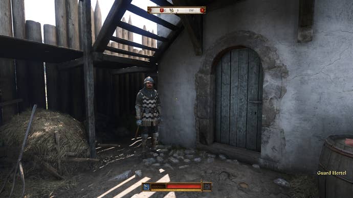 A guard watching the door to the Nebakov jail during the Back in the Saddle quest in Kingdom Come Deliverance 2.
