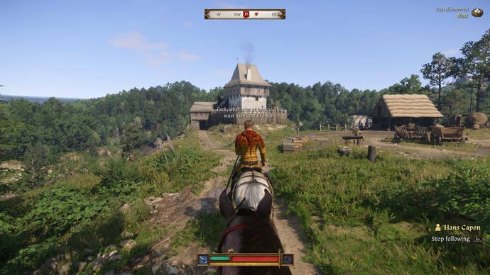 Henry riding behind Hans Capon on horseback during the Back in the Saddle quest in Kingdom Come Deliverance 2.