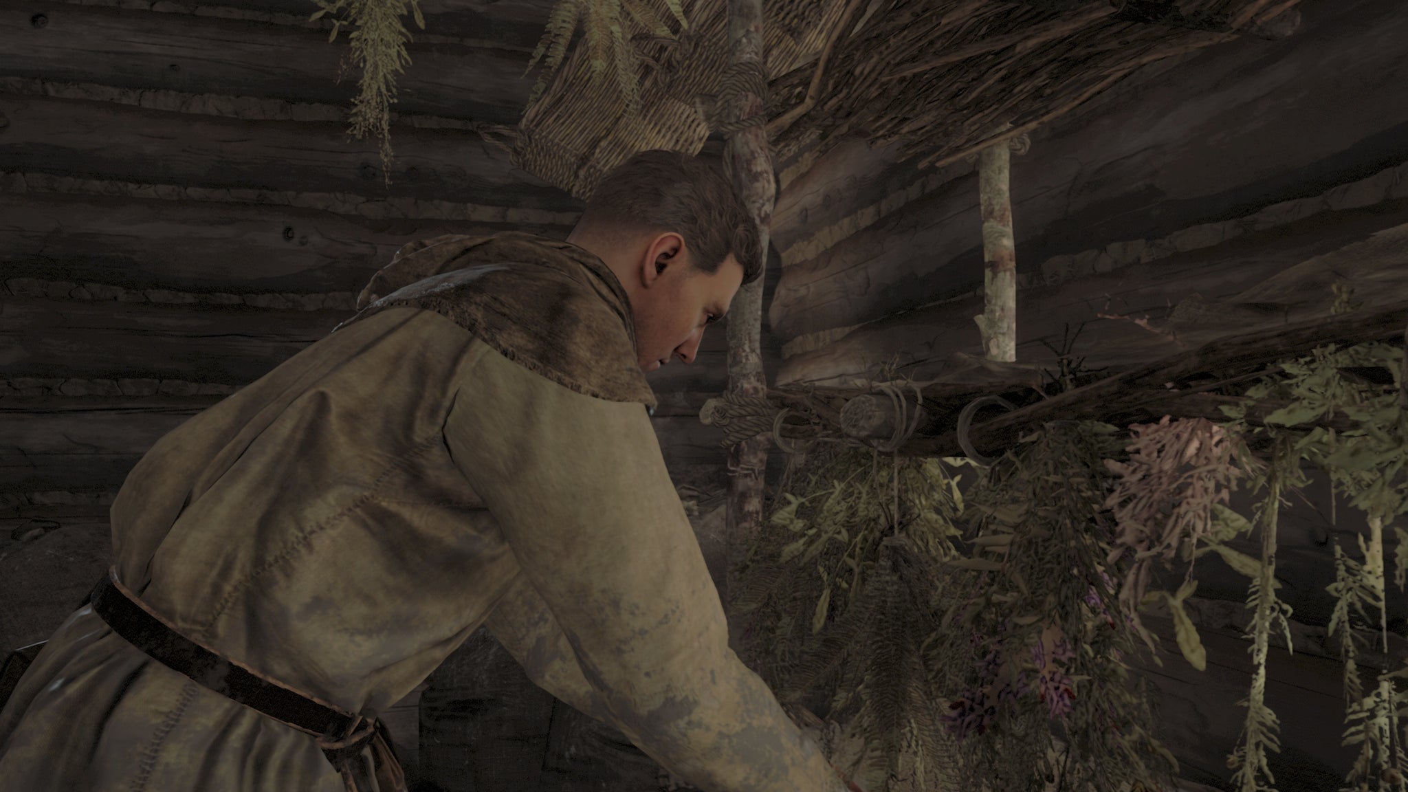 Henry placing herbs on a drying rack in Kingdom Come Deliverance 2 - 5